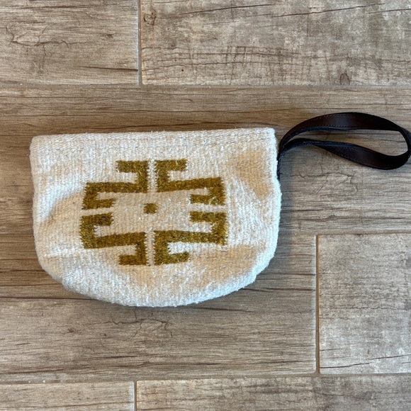 Handbags - Handmade, one of a kind hundred percent wool clutch with leather wrist band.